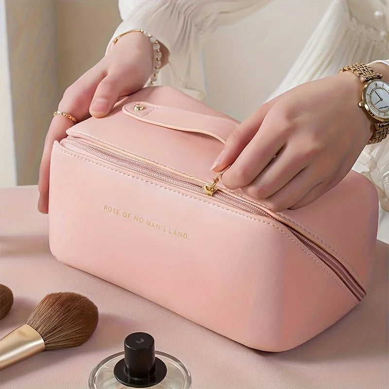 Close-up of the toiletry bag's zippered compartments