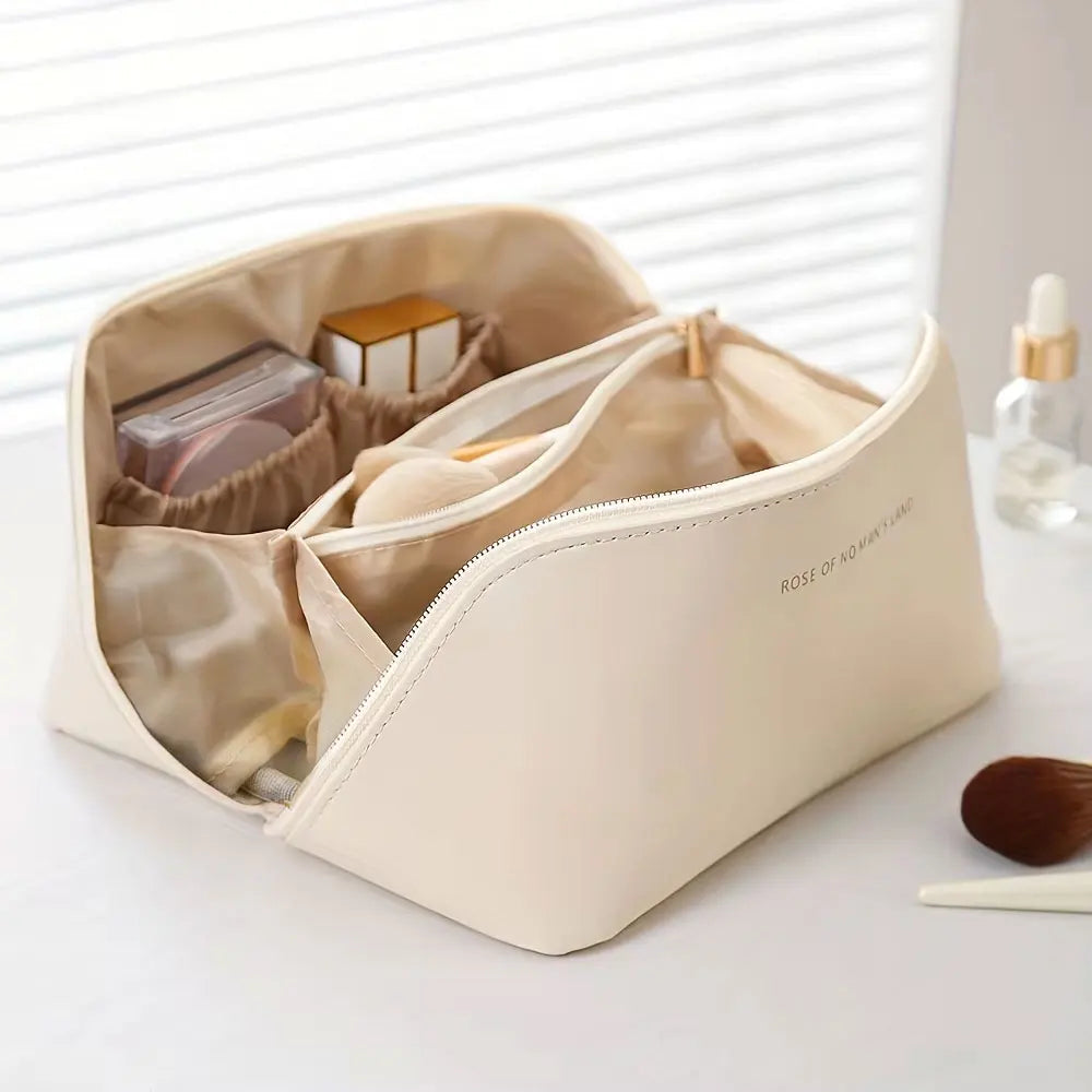 Travel toiletry bag hanging open for easy access while traveling