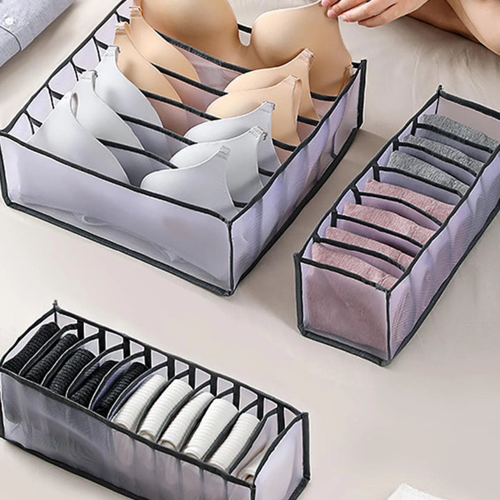 Drawer divider organizer shown in white, black, beige, and gray