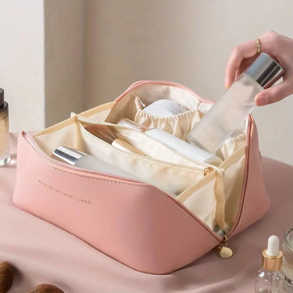 Travel toiletry bag shown in brown, black, pink, and white