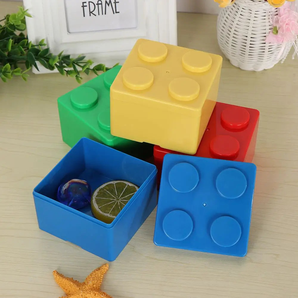 Stackable modular storage box holding pens and craft supplies