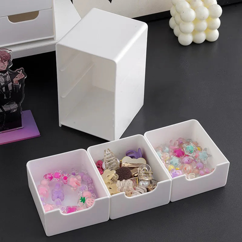 3-tier desk organizer with drawers open showing pens and paper clips