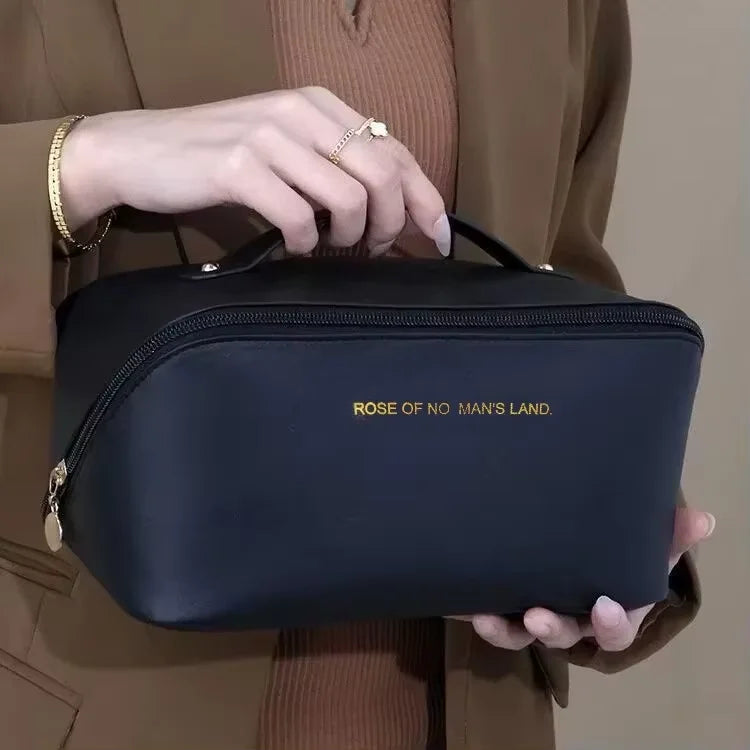 Large capacity travel toiletry bag packed with makeup and skincare